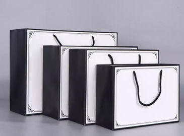 acheter Les sacs de transporteur de luxe adaptés aux besoins du client de taille, cadeau écologique met en sac l'impression offset fabrication en ligne