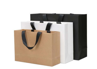 La longévité élevée a imprimé la conception adaptée aux besoins du client de forme de résistance de larme de sacs en papier de Papier d'emballage fournisseur