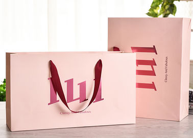 Les sacs à provisions de papier de poignée de ruban avec la colle résistante à la chaleur forte renforcent fournisseur