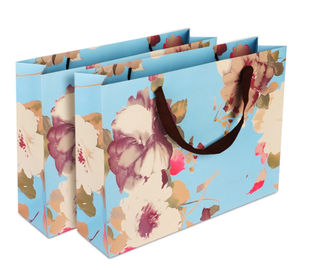 La coutume de conception sensible a imprimé les sacs en papier/l'OEM/ODM de sacs marchandises de papier disponible fournisseur