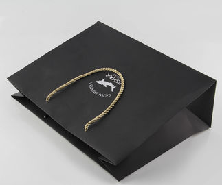 La couleur noire a imprimé l'élasticité élevée de sacs en papier de Papier d'emballage avec la poignée en nylon de corde fournisseur