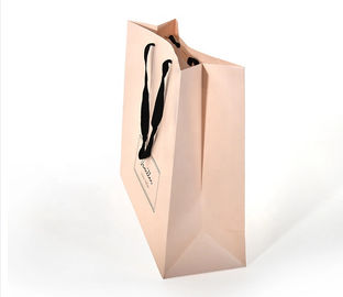 La poignée plate de coton conçoivent des sacs en papier en fonction du client, couleur rose de papier imprimée de sacs à provisions fournisseur
