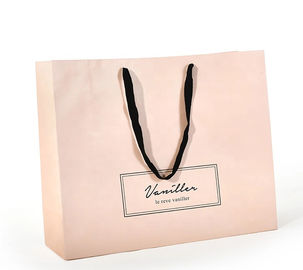 La poignée plate de coton conçoivent des sacs en papier en fonction du client, couleur rose de papier imprimée de sacs à provisions fournisseur