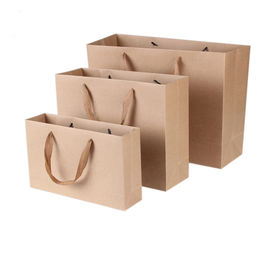 acheter Les sacs en papier imprimés biodégradables de Brown, cadeau de papier d'emballage met en sac la longévité élevée fabrication en ligne