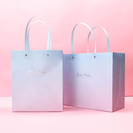 Le cadeau imprimé belle par coutume met en sac le logo adapté aux besoins du client doux avec la poignée plate fournisseur
