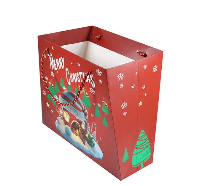 La taille adaptée aux besoins du client a personnalisé le matériel imprimé de papier enduit de sacs de cadeau pour Noël fournisseur