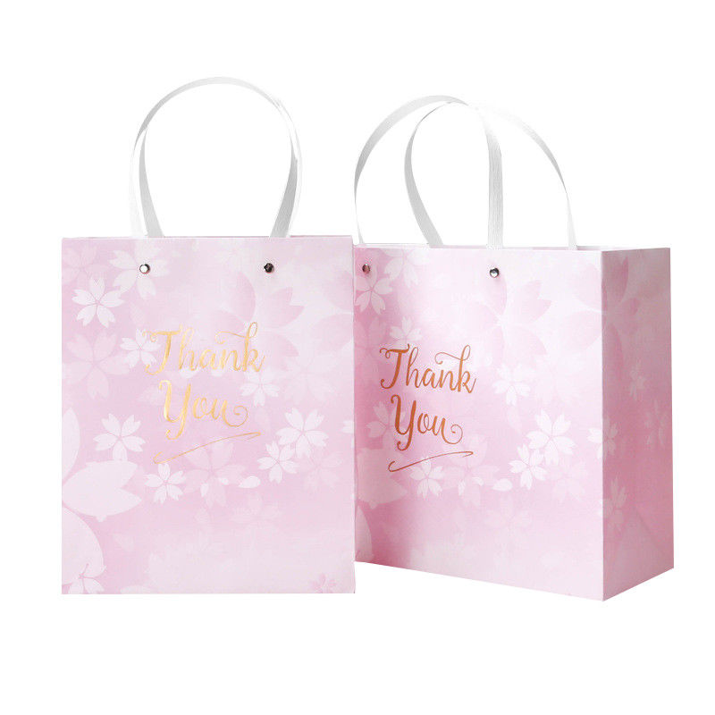 Le cadeau imprimé belle par coutume met en sac le logo adapté aux besoins du client doux avec la poignée plate fournisseur
